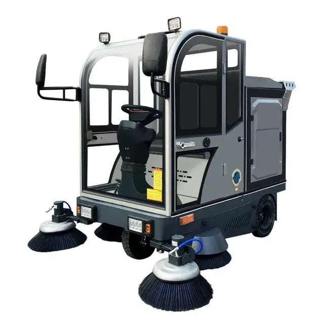 Automatic ride on sweeper truck