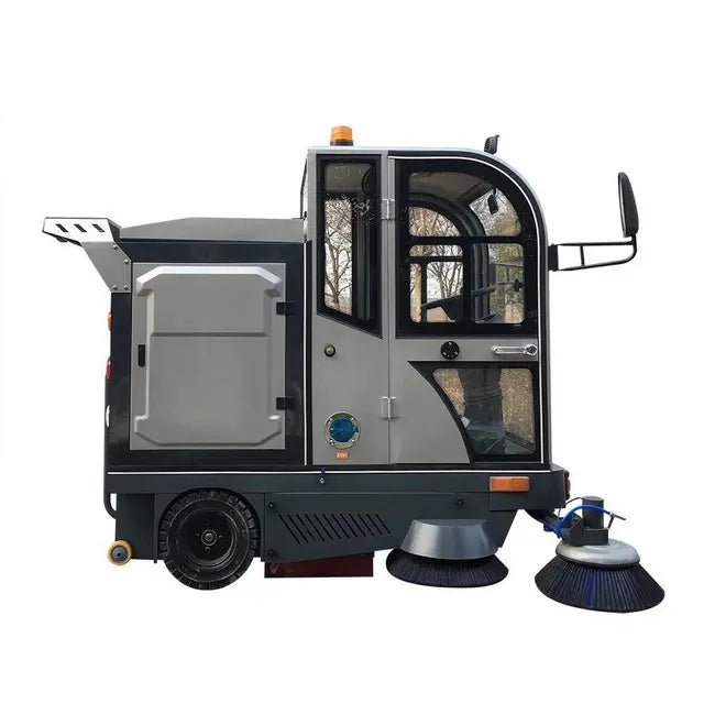 Automatic ride on sweeper truck