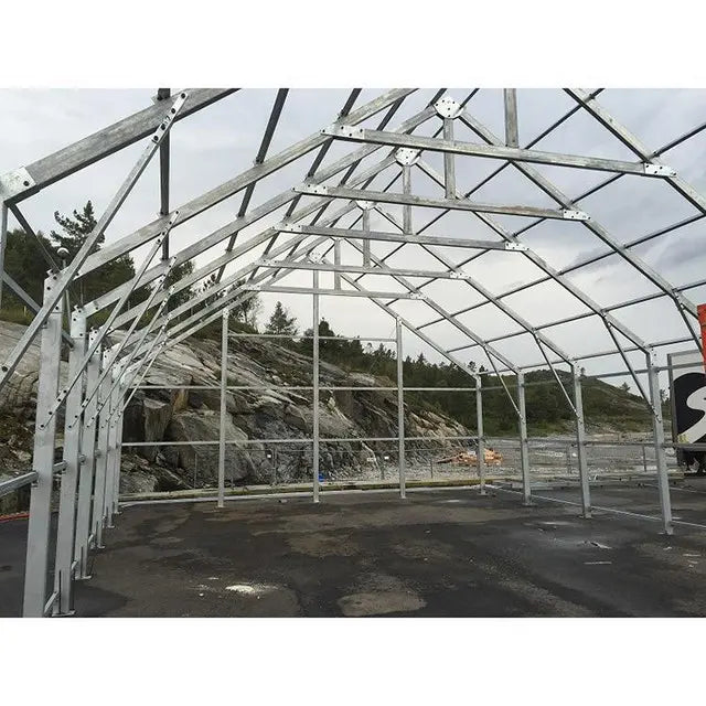 Steel Building Storage / Warehouse with electric overhead door 65′ X 33′ X 23′ (SBW-65)