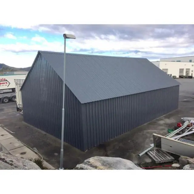 Steel Building Storage / Warehouse with electric overhead door 65′ X 33′ X 23′ (SBW-65)