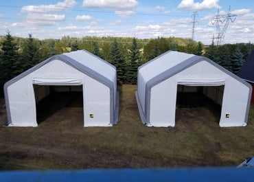 Ferme double en forme de pointe 70′ de largeur 100′ de longueur 28′ de hauteur