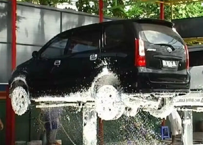 In-ground single post car lift – X shape